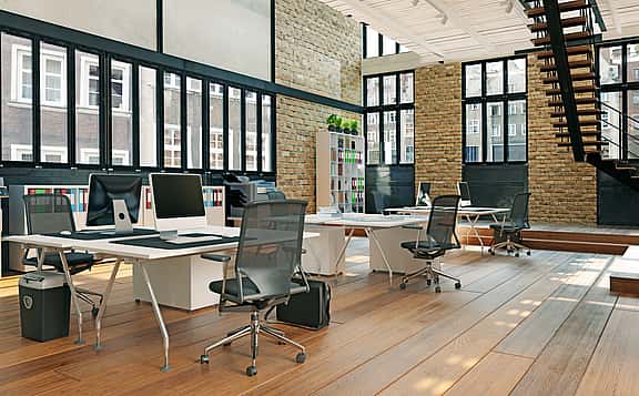 Modern and inviting office space furnished with high-quality desks, chairs, and storage solutions, showcasing grenke's flexible financing options for office furniture.