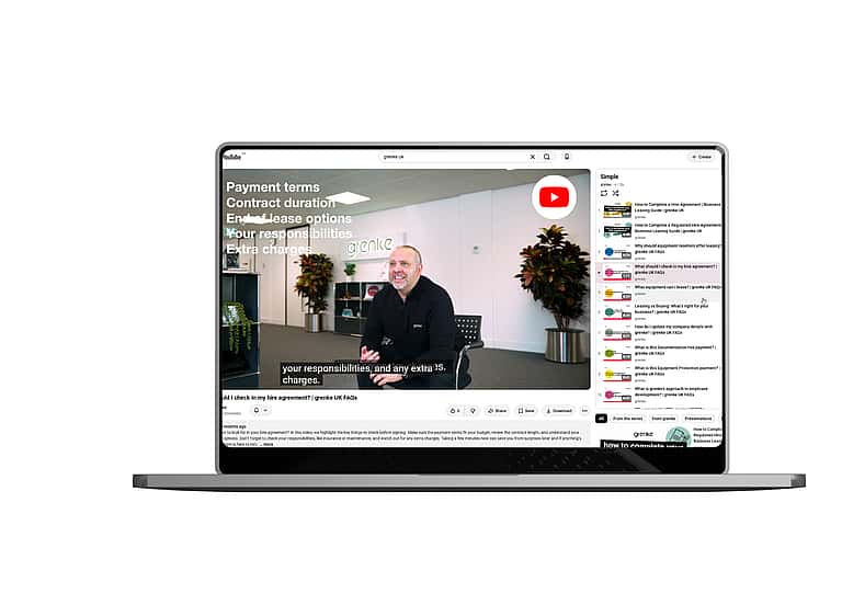 Laptop showing youtube channel for grenke with multiple FAQs in playlist