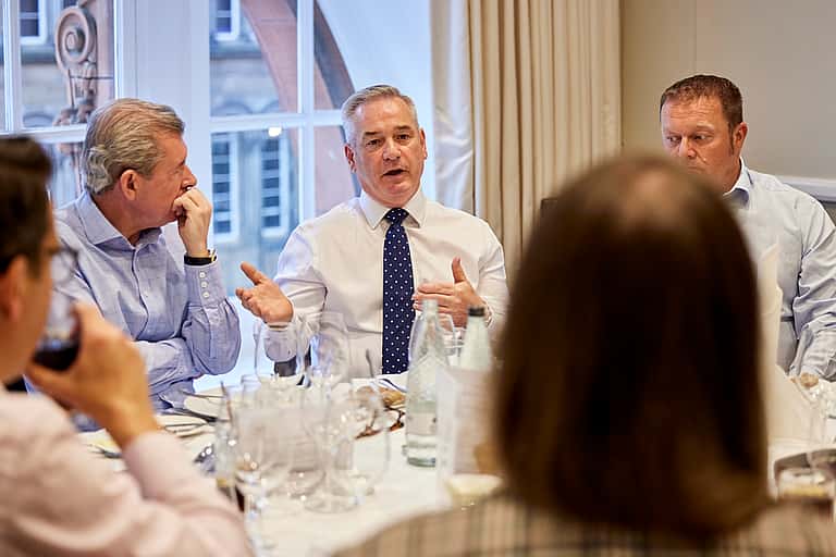 David Horton of grenke Leasing, Jim Kane of Target Communications Group Limited, and Chris Lowery of NWR Hygiene Group participating in a round table discussion on leasing solutions for SMEs.