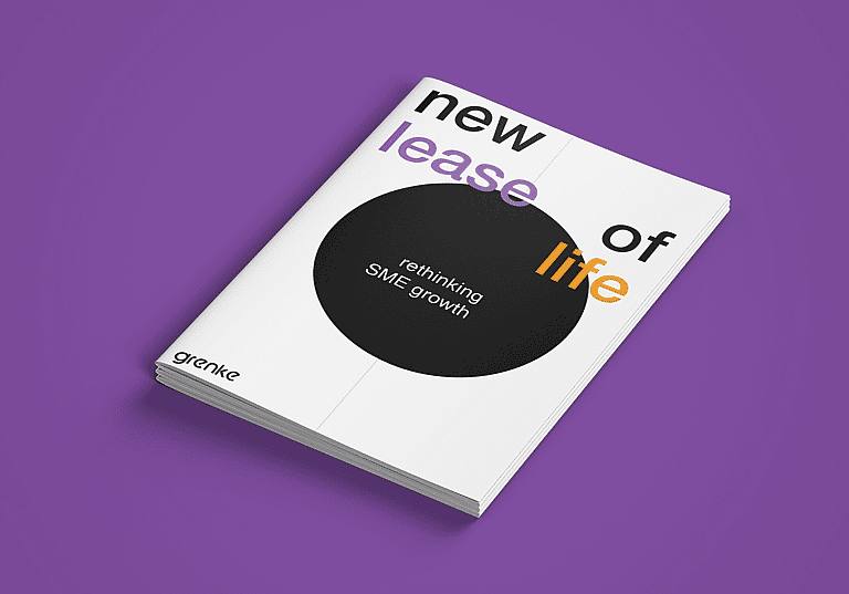 A photo of the physical copy of grenke's New Lease of Life research report, detailing the untapped potential and benefits of equipment leasing for SMEs, based on insights from over 500 businesses and over 40 years of industry experience.