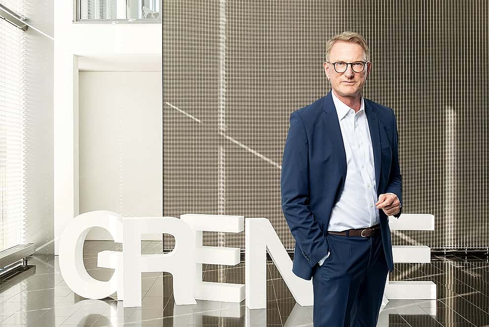 Photo of Michael Bücker, CEO of grenke AG, symbolizing leadership transition and strategic focus on ESG and digitalization.